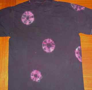 black shirt with red circles