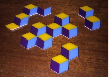 cubits puzzle assembled into several small shapes